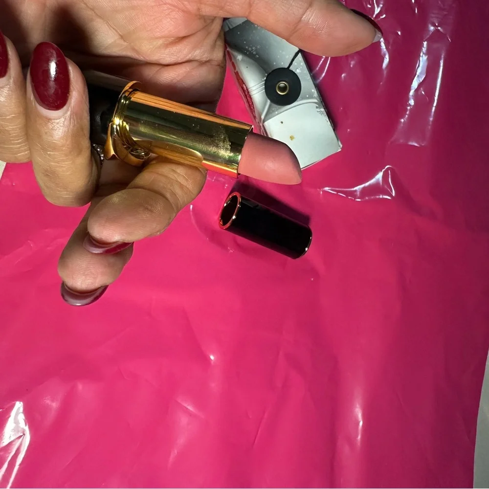Luxurious Lipstick by PatMcgrath with Gold Accent in shade 020 Femmebot.